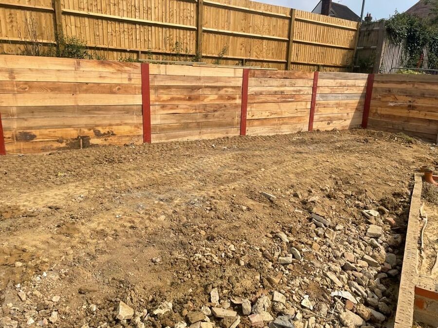 Timber sleeper retaining and steps formed on site